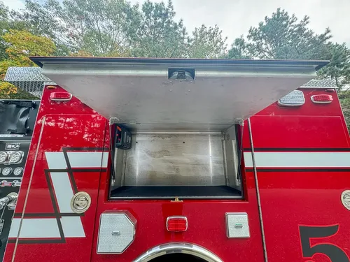 Open upper side compartment with deep shelf space.