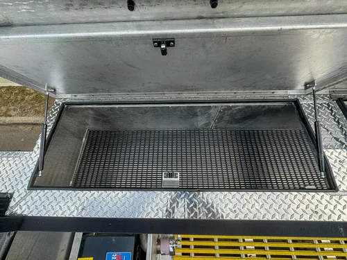 Top rear compartment open with black anti-slip floor.