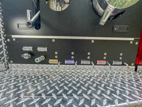 Lower pump control strip with labeled switches and connectors.