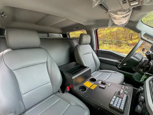 Front seats and center console view from passenger side.