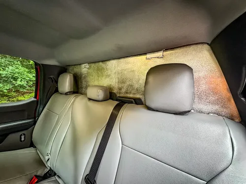 Rear bench seat close-up from opposite side with clean upholstery.