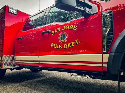 Driver door close-up with San Jose Fire Department emblem.