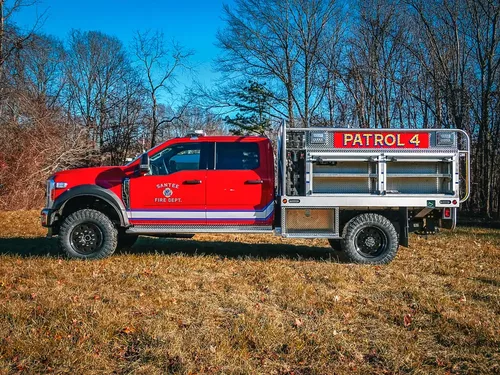 Right-side profile with multiple compartment doors open.