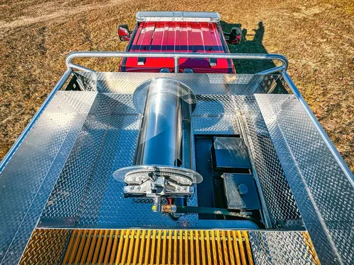 Top-center equipment mount close-up on upper deck grating.
