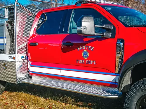Driver-side door close-up with Santee Fire Department emblem.