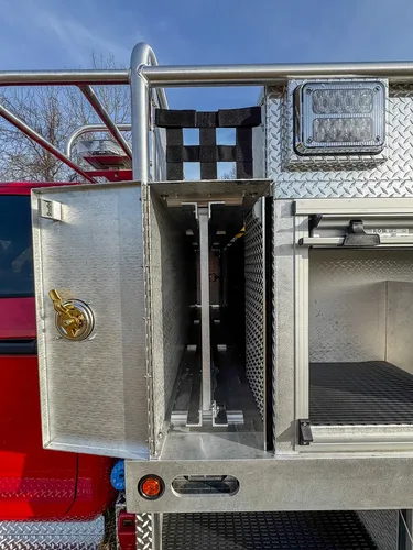Red brush truck exterior or equipment detail, photo 38 of 97.