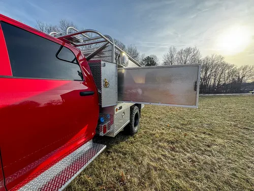 Red brush truck exterior or equipment detail, photo 47 of 97.