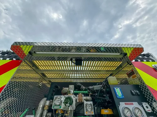 Top rear view into pump bay under the open upper hatch.