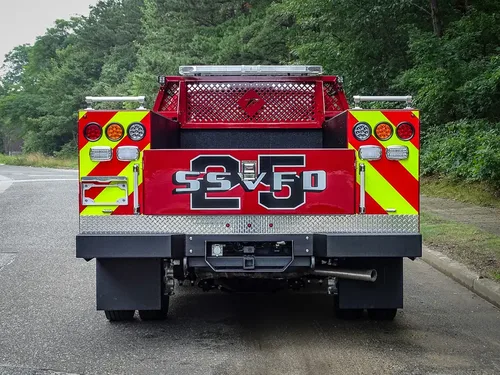 Straight rear view with chevron striping and rear department lettering.