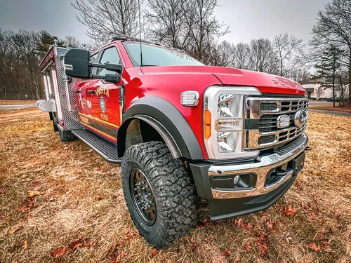 Front-right three-quarter exterior view of the truck on grass.