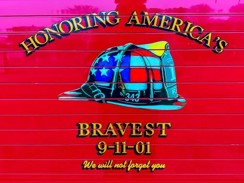 Decorative side panel graphic honoring America's bravest with helmet artwork.