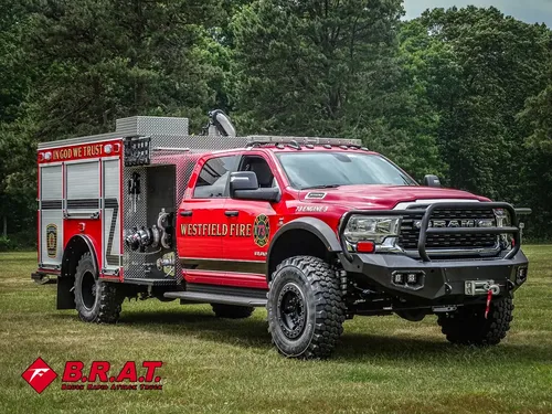 Front-left side view of the truck with rear body compartments visible.
