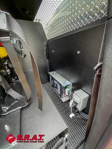 Rear floor equipment mount and battery/tool pack close-up.