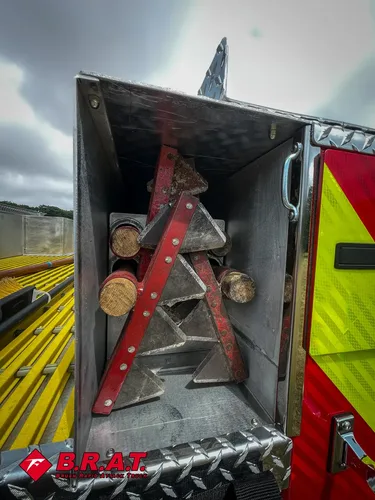 Top-side area close-up with mounted tools near rear corner.