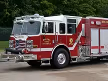 Pumper front-left exterior profile showing cab and side body