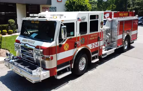 Pierce pumper elevated rear deck view showing hosebed and rear control area