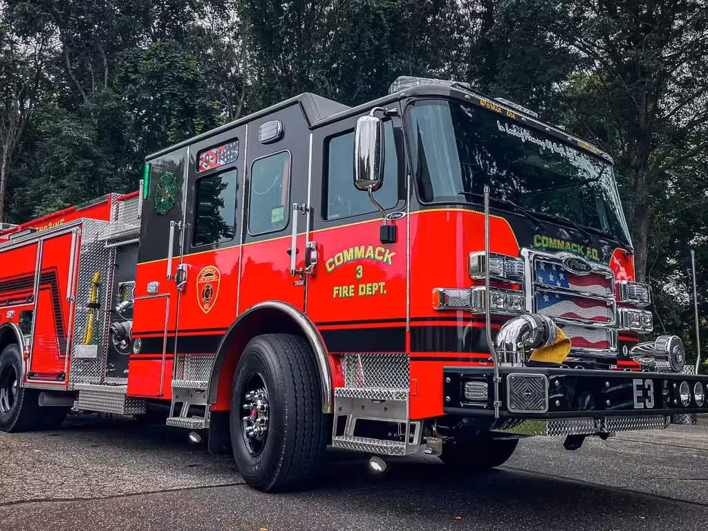 Pumper rear-left exterior view showing side body and rear chevrons
