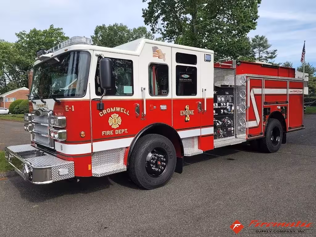 Pumper front-left exterior view showing enclosed cab and side compartments