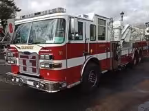 Small front-left exterior thumbnail of tower ladder truck