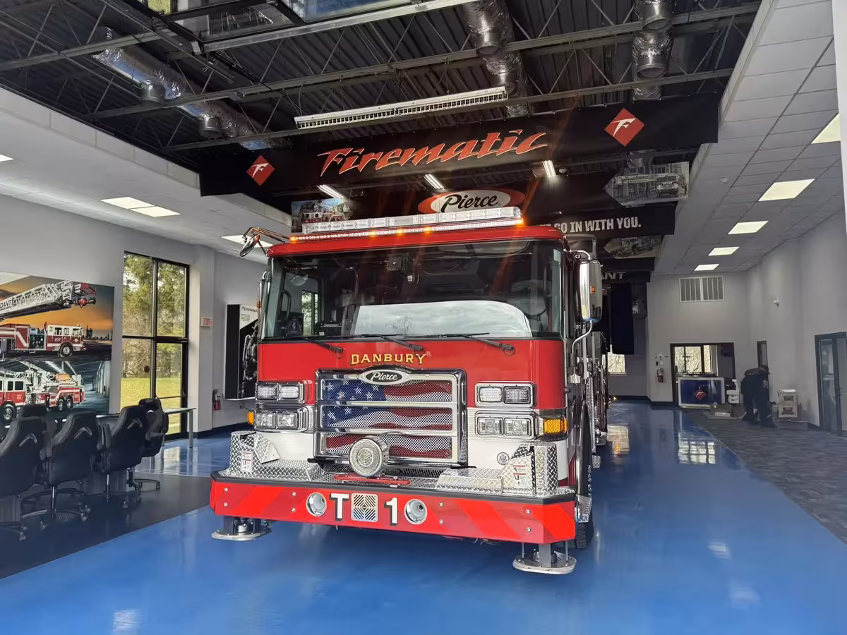 Danbury Pierce Enforcer 100-foot aerial tower front view inside the apparatus bay