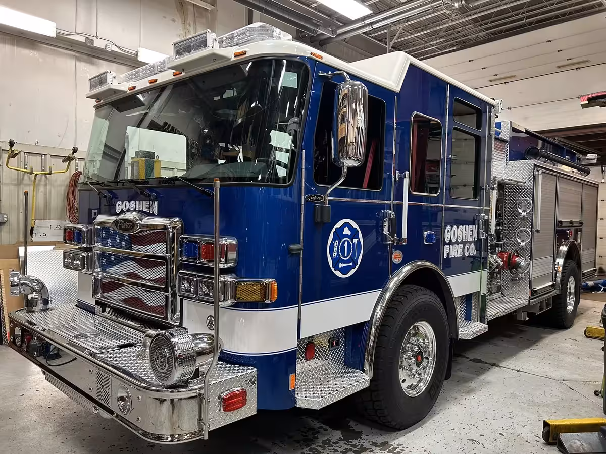 Goshen Pierce Enforcer pumper front-left exterior view inside the apparatus bay