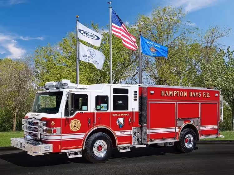 Pierce rescue pumper driver-side profile with enclosed cab, pump panel, and body compartments