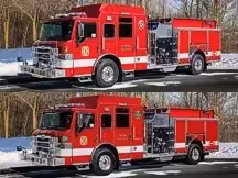Two stacked front-left views of matching red pumpers on display.
