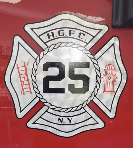 Cab door emblem close-up showing crest graphic and number panel