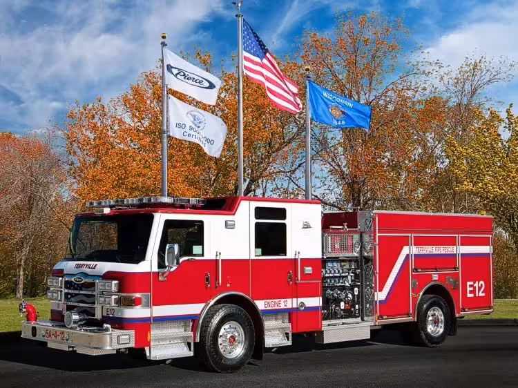 Terryville fire engine front-left exterior view with enclosed cab and side compartments