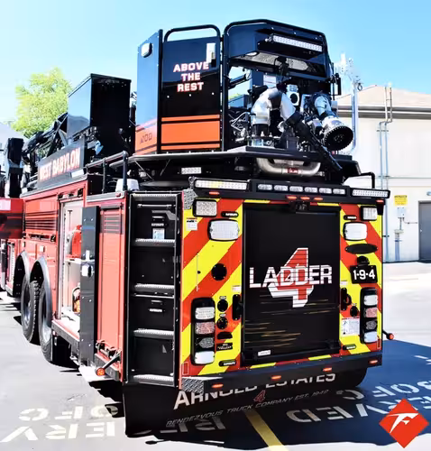Rear view showing tower platform, rear body panel, and warning lights