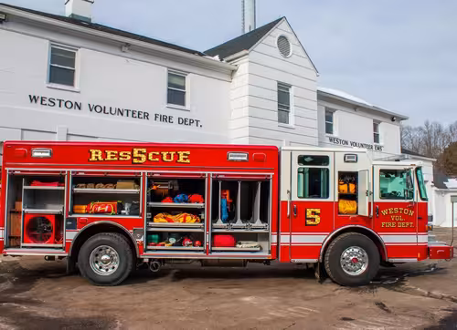 Weston Pierce heavy rescue open driver-side compartment showing organized rescue equipment storage