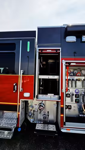 Open mid-body compartment showing shelves and pump-side connections