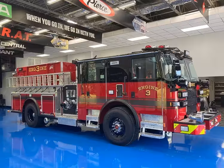 Pumper front-left exterior view showing grille, bumper, and side body
