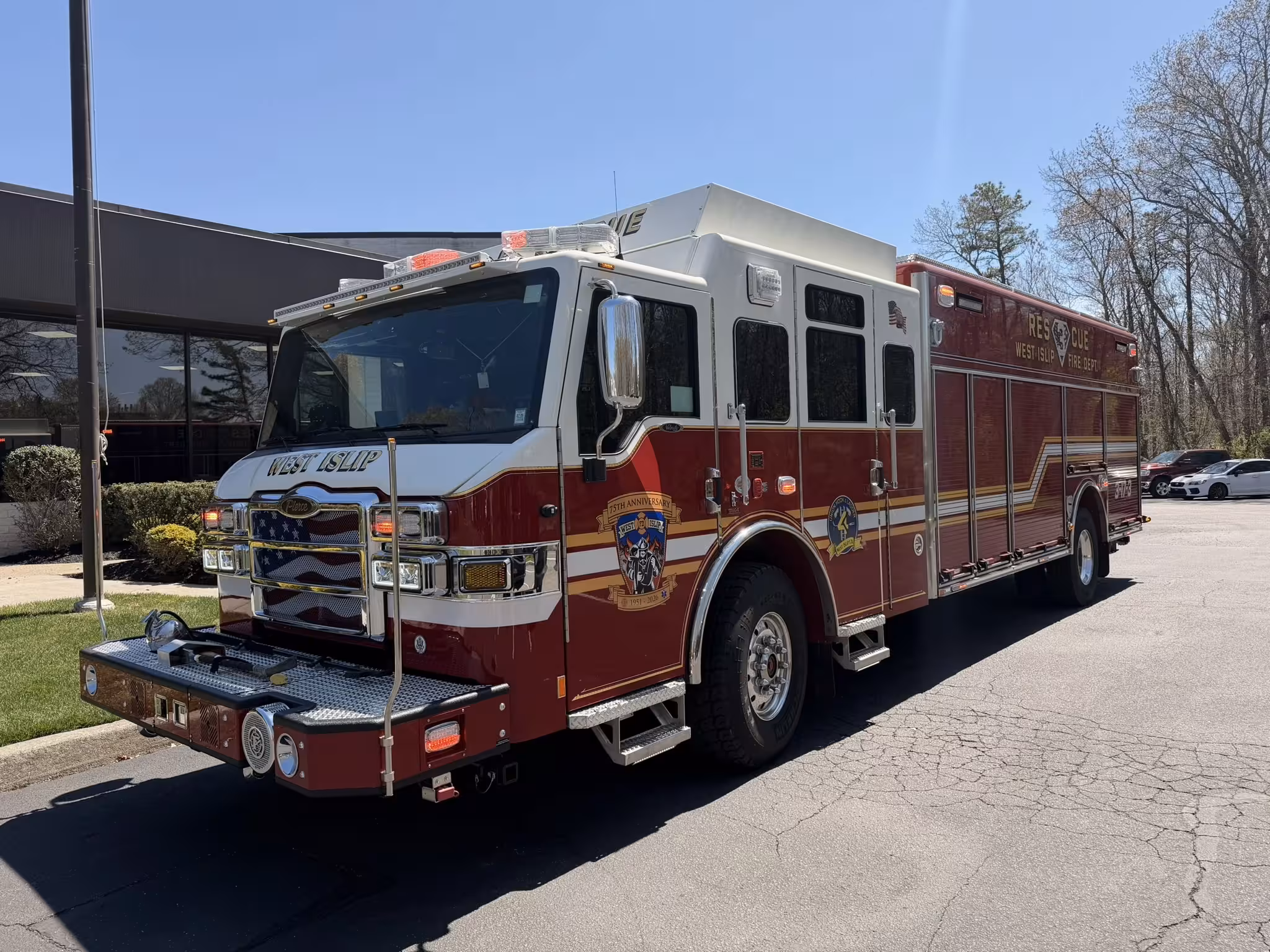 Pierce heavy rescue front view showing bumper, grille, and warning lights