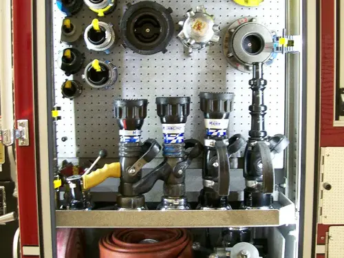 Open side control panel showing gauges, valves, and intake ports
