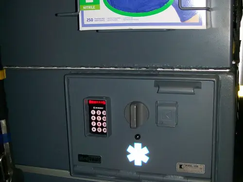 Cab-side control panel close-up showing keypad and status indicator