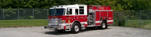 Pumper front-left exterior profile showing full side body