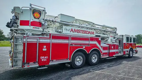 Rear-left exterior view showing side body and rear chevron section