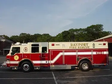 Full right-side profile showing long compartment body and crew cab layout.