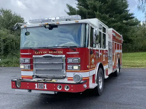 Pumper front-left exterior view showing grille, bumper, and side body