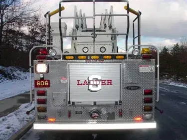 Rear view showing ladder truck tailboard and upper bucket platform