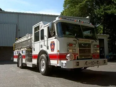 Front-right exterior view showing cab and side body compartments