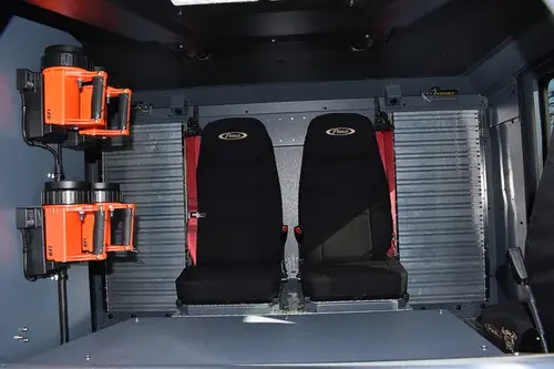 Rear crew seating view showing SCBA seat mounts and straps