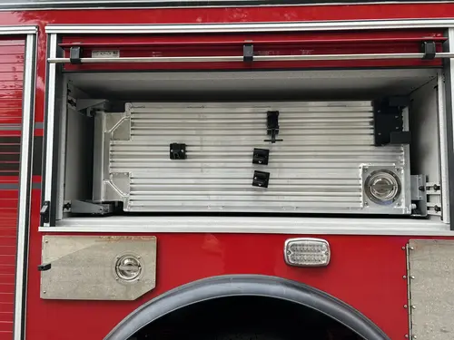 Branford Pierce Impel PUC pumper open compartment with extinguishers and storage bins