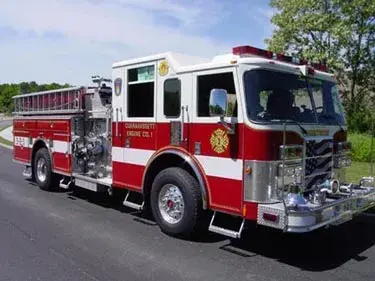 Front-left exterior view showing cab and side body profile