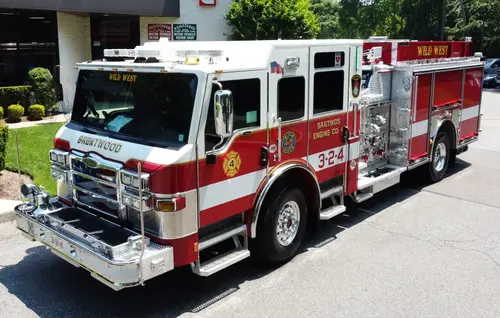 Pierce pumper elevated rear deck view showing hosebed and rear control area