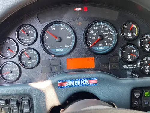 Dashboard warning indicator close-up above the instrument cluster