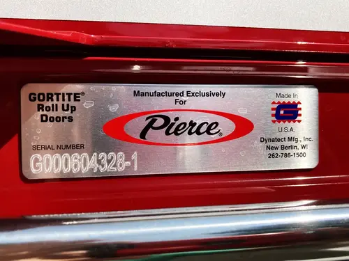 Velocity nameplate close-up on side body striping