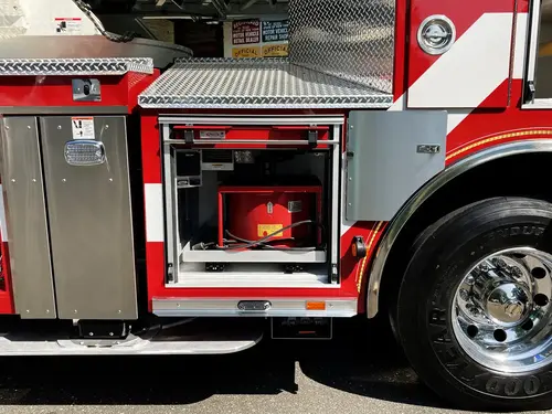Octagonal utility access port close-up on side body panel