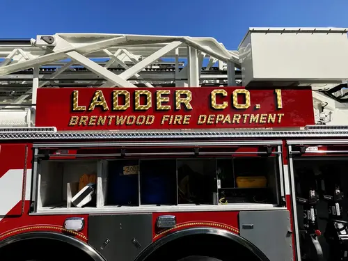Aerial side lettering close-up beneath nested ladder sections